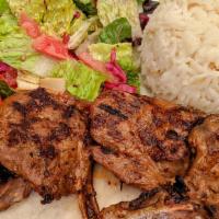 Lamb Chops · Baby lamb chops grilled to your taste served with rice and salad.