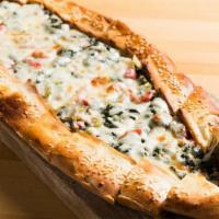 Ispanakli Pide (Spinach Pide) · A thick dough crust stuffed with spinach and mozzarella cheese.
