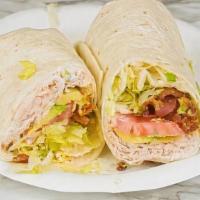Turkey Club Wrap · Oven gold turkey, lettuce, tomato, bacon, and mayo. Served on a plain wrap.