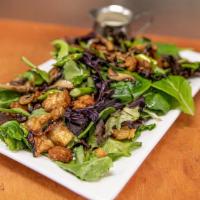 Porchetta Salad · Our signature salad with waipoli greens, shallot vinaigrette, sautéed mushroom medley, aspar...
