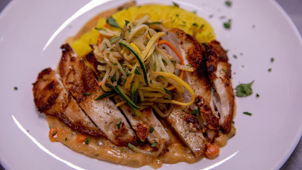 Pan Roasted Chicken · Pan roasted chicken breast served with turmeric rice, vegetable medley and mushroom gravy