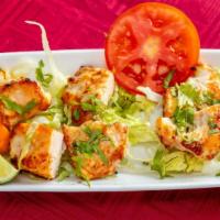 Chicken Malai Kabab · Tender pieces of chicken marinated in cream cheese and spices.