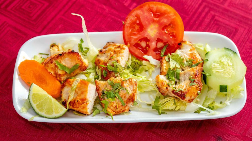 Chicken Malai Kabab · Tender pieces of chicken marinated in cream cheese and spices.