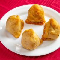 Vegetable Samosas · India's most popular snack - pastry with a filling of peas and potatoes . Vegan.