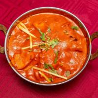 Chicken Makhani (Butter Chicken) · Slices of chicken cooked in a sweet and mild curry. Served with basmati rice.