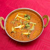 Daal Makhani · Vegetarian. Black lentils with tomato flavored sauce. Served with basmati rice.Vegan option ...