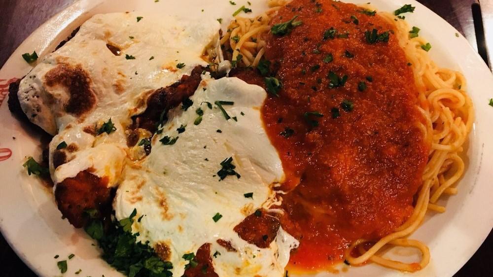 Veal Parmigiana · Tender cutlets of veal topped with fresh mozzarella and our smooth marinara sauce served with your choice of pasta or sauteed vegetables.