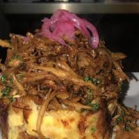 Vaca Frita · Shredded fried beef seasoned with lime & onions served with moro rice