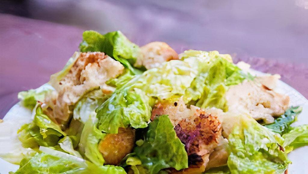 Caesar Salad · with romaine lettuce, croutons, parmesan cheese & caesar dressing