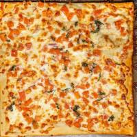 Bruschetta Pie · White pizza, tomato, onion, basil, EVOO, red wine vinegar, salt, and pepper.
