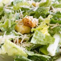 Caesar Salad · Fresh salad made with crispy romaine lettuce, shaved Parmesan cheese, multigrain croutons, a...