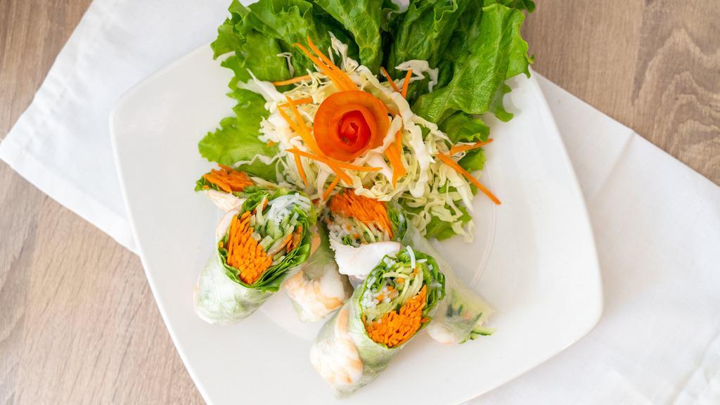 Summer Rolls · Two pieces. Vegetable, marinated chicken, and blanched shrimp wrapped in soft rice paper served with our special house sauce.