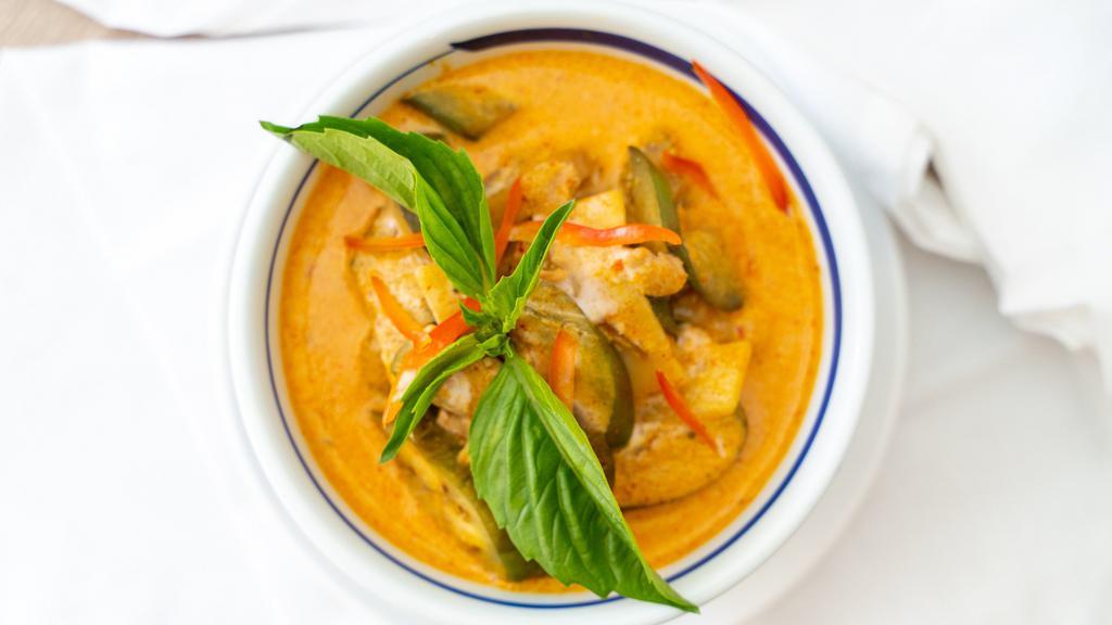 Red Curry · House red curry sauce prepared with coconut milk, young bamboo shoots, eggplants, long beans, and sweet basils.