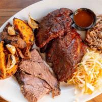 Smoked Barbeque Platter · Gluten free. Our signature house-smoked tender beef brisket, meaty, sweet, & tangy BBQ baby ...