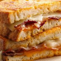 Grilled Cheese · serve on two slice of butter toasted bread with melted cheese.