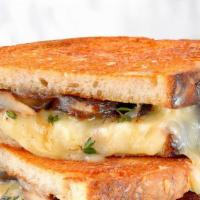 Godzilla Grilled Cheese · Mushrooms sauteed in cream sauce, grilled onions, pepper jack cheese, American cheese on cho...