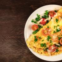 Build Your Own Omlette · Build it your way served with home fries and toast.