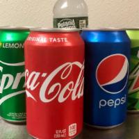 Soda (12 Fl. Oz Can) · Pepsi, MTN Dew, Orange, Brisk Ice Tea, Coke, Sprite, Ginger ale,