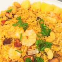 Pineapple Fried Rice · BBQ pork, shrimp, pineapple, cashews and scallions tossed in light soy sauce.