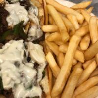Philly Cheese Steak With Fries · with pepper. onion. mushroom and provolone cheese
