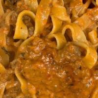 Bolognese Pasta · Creamy meat sauce mixed with choice of pasta.