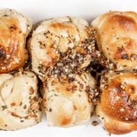 Garlic Knots Catering · A classic snack, our garlic knots are strips of pizza dough tied in a knot, baked, and then ...