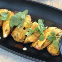 Chicken Tikka · Chicken breast marinated with indian spices and cooked in tandoor oven served with mint chut...