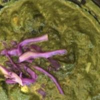 Palak Paneer · Indian cottage cheese cooked with spinach and spices in a creamy and flavorful curry.