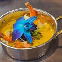 Shrimp Mango Curry · A creamy mango curry loaded up with chopped peppers, onions, coconut and finished off with f...
