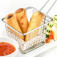Vegetarian Spring Rolls · Crispy fried rolls with vermicelli noodle, cabbages, carrots served with plum sauce.