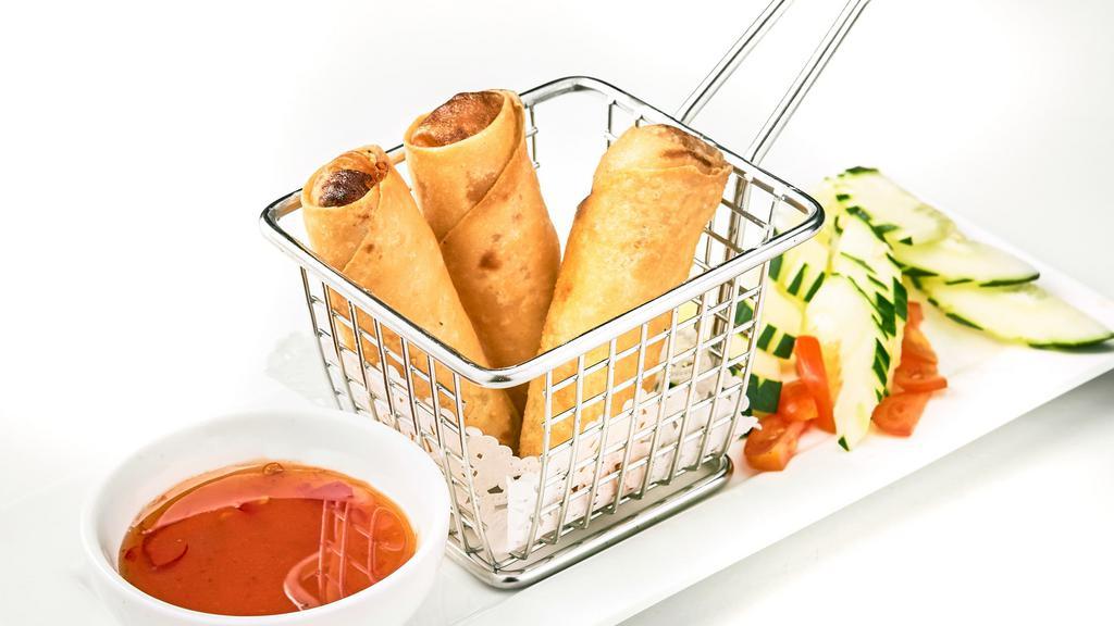 Vegetarian Spring Rolls · Crispy fried rolls with vermicelli noodle, cabbages, carrots served with plum sauce.