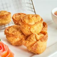 Fried Wontons · Ground chicken and shrimp wontons served with plum sauce.