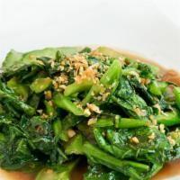 Steamed Chinese Broccoli · Sauteed with oyster sauce and garlic.
