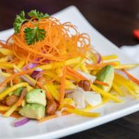Mango Salad · Green mango, avocado, red onions and cashew nuts in lime juice dressings.