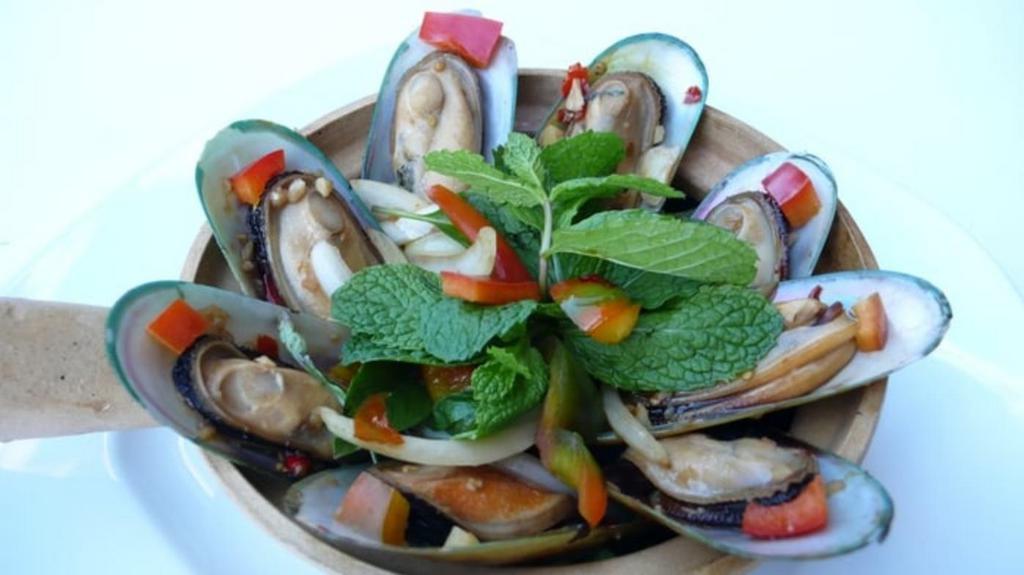 Green Mussels · Steamed mussels with basil, lemongrass, lime leave, galangals and white wine.