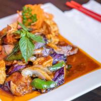 Spicy Eggplants · Sauteed eggplants, tofu, garlic, bell peppers and basil in brown chili sauce served with ste...