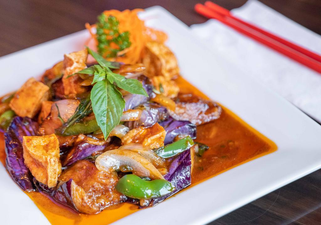 Spicy Eggplants · Sauteed eggplants, tofu, garlic, bell peppers and basil in brown chili sauce served with steamed jasmine rice.