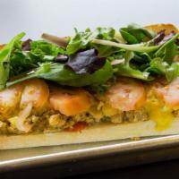 Tuna Melt · Sandwich-chickpea-tuna salad, cheese sauce, greens, tomato, and vegan mayo on toasted ciabat...