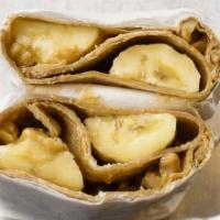 Monkey Brain Wrap · Banana, peanut butter, walnuts, chocolate chips, honey, cinnamon, and sea salt sprinkle.