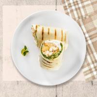 Seizing Caesar Chicken Wrap · Grilled chicken breast, romaine, croutons, parmesan cheese and Caesar dressing wrapped in yo...