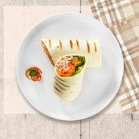 Turning Tuna Wrap · Italian style tuna salad made with sauteed vegetables and low fat Italian dressing with toma...