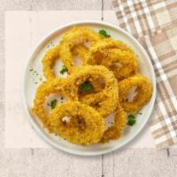 Crispy Onion Hoops · Sliced onions dipped in a light batter and fried until crispy and golden brown.