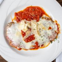 Chicken Parmigiana · Breaded chicken with tomato sauce and mozzarella cheese