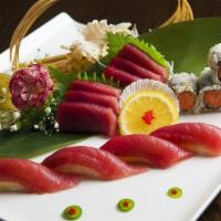 Tuna Lover · Four pieces of sushi, six pieces of sashimi and one spicy tuna roll. Served with soup or sal...