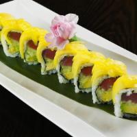 Golden Tuna Roll · Tuna, avocado, cucumber inside, topped with mango with chef?s sauce.
