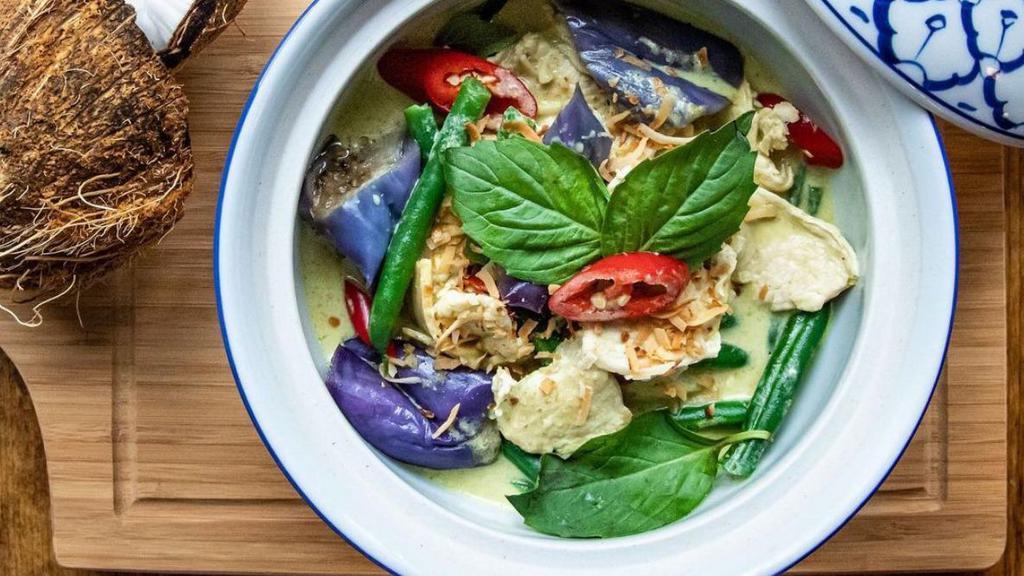 Green Curry (Spicy) · bamboo shoot, eggplant, long hot chili, string bean and Thai basil in coconut milk sauce