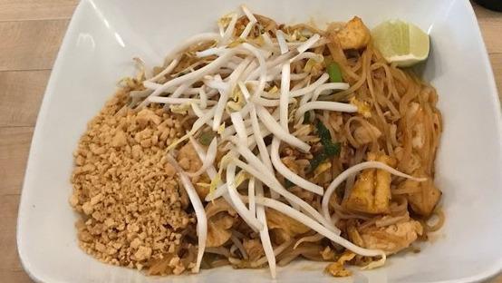 Pad Thai Noodles (Not Spicy) · Thin rice noodles, egg, bean sprout, tofu, scallion, chopped peanut, and tamarind sauce.