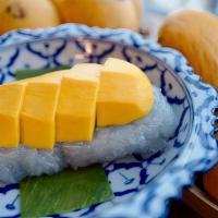 Mango With Coconut Sticky Rice · champagne mango with sweet coconut sticky rice