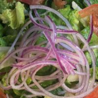 House Salad · Lettuce, tomatoes, red onions, cucumbers and green olives.