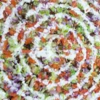 Taco Pizza · Beef, mozzarella, lettuce, tomato, onions, ranch dressing.